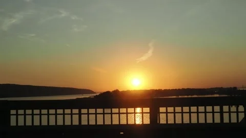 View from the window of a car moving along the road at sunset 스톡 동영상 286026344