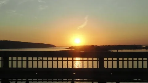 View from the window of a car moving along the road at sunset 스톡 동영상 286026450