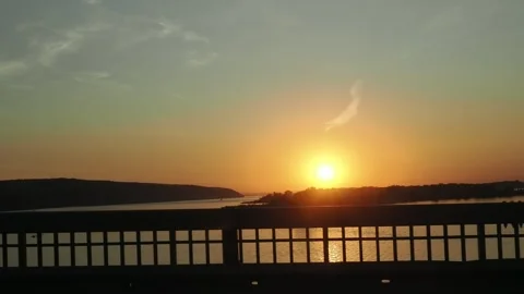 View from the window of a car moving along the road at sunset 스톡 동영상 286026561