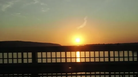 View from the window of a car moving along the road at sunset 스톡 동영상 286026664