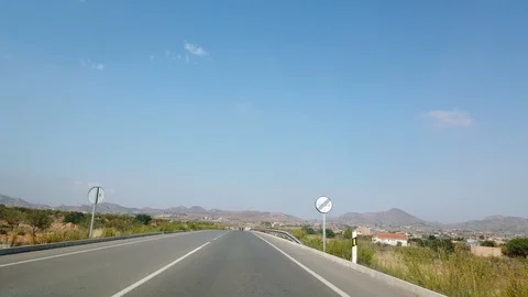 The view from the window of a car that rides on a beautiful road. Video stock 122453206