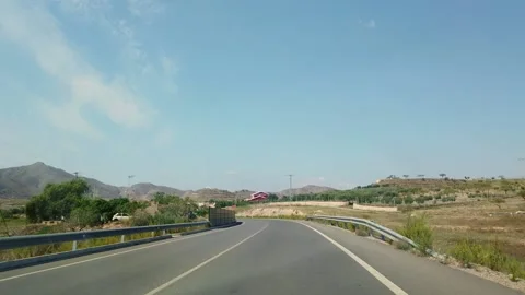 The view from the window of a car that rides on a beautiful road. Stock-Footage 133808199