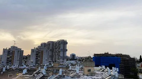 View from the window. The city at sunset Фото