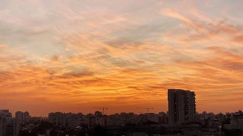 View from the window. The city at sunset 库存照片