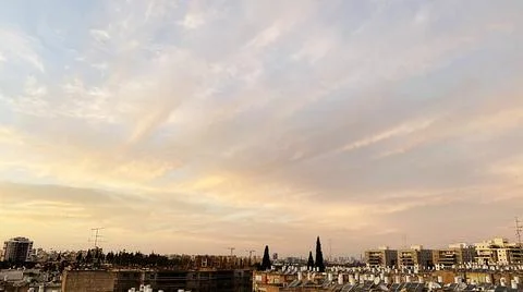View from the window. The city at sunset 库存照片