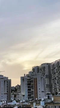 View from the window. The city at sunset 写真素材