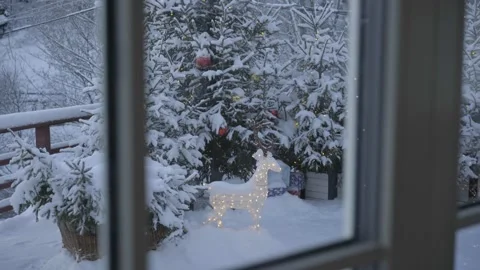 The view from the window to the courtyard is decorated for Christmas. xmas deer Stock Footage 236549028
