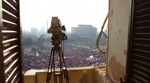 View from a window onto crowds of protestors in Cairo, Egypt. Stock-Footage 25395349