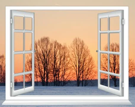 View from the window with the curtains of the sunset over the snow Stock Photos