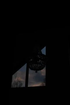 The view from the window of the dramatic sunset sky with clouds. Stock Photos