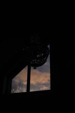 The view from the window of the dramatic sunset sky with clouds. Stock Photos