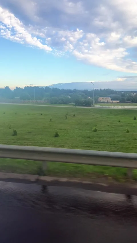 The view from the window of a driving car. Vertical video Stock Footage 281175049