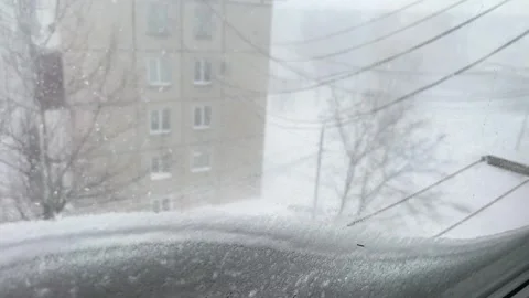 View from the window during heavy snowfall Stock Footage 263006472