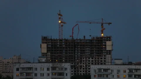 The view from the window on the evening construction with residential buildings Stock Footage 113785728