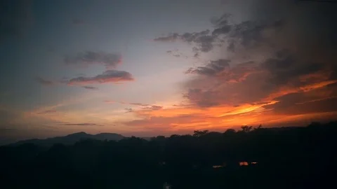 View from the window of an express train of sunset with colorful lights and Stock Footage 92710643