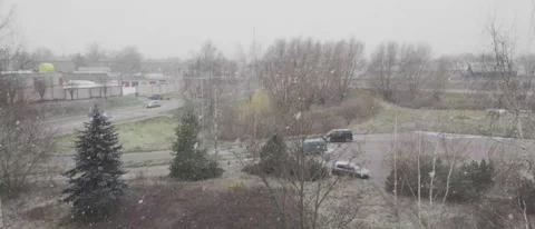 View from the Window First Snowfall and Road Slow Motion Stock Footage 222924983