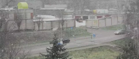 View from the Window First Snowfall and Road Slow Motion Stock Footage 222925230