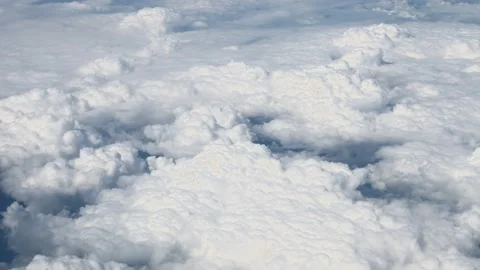 View from the window flying plane to the beautiful clouds. Air transport concept Stock Footage 156133093