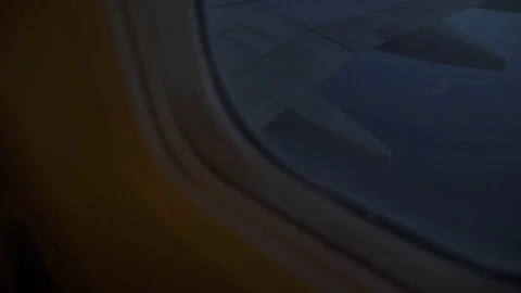 View from the window of a flying plane, at night 스톡 동영상 75862070