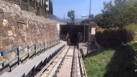 View from window of funicular going up to Tibidabo in Barcelona Stock Footage 107991195