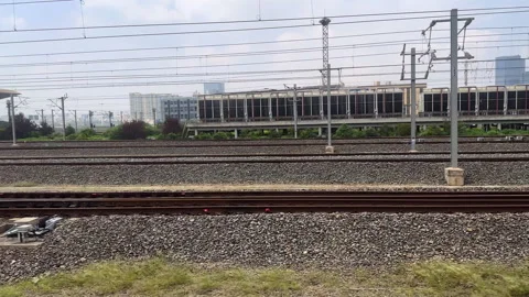 View from the window of high-speed bullet train approaching Nanjing Stock Footage 290834045