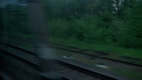 View from window of high-speed train on landscape of beautiful nature wild field Stock Footage 156268852