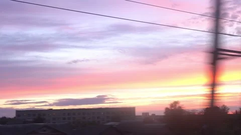 View from window of high-speed train on landscape of beautiful nature field road Stock Footage 156306970