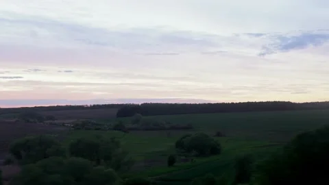 View from window of high-speed train on landscape of beautiful nature field road Video stock 156761025