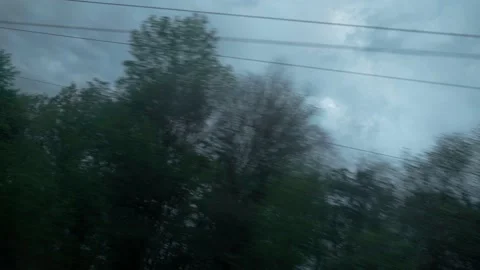 View from window of high-speed train on landscape of beautiful nature wild field Video stock 157071037
