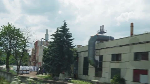 View from window of high-speed train on landscape of industrial zone old soviet Video stock 157610369