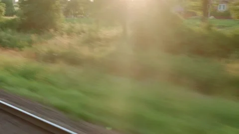 View from window of high-speed train on landscape of beautiful nature wild field Video stock 157942182