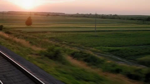 View from window high-speed train on landscape of beautiful nature wild field Stock Footage 159168811