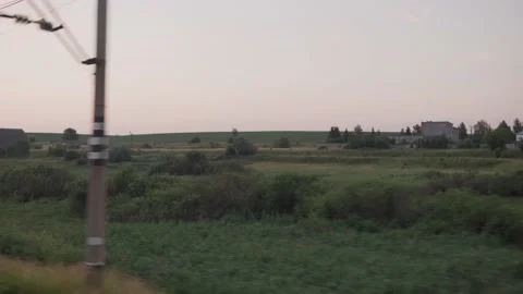 View from window high-speed train on landscape of beautiful nature wild field Stock Footage 159168845