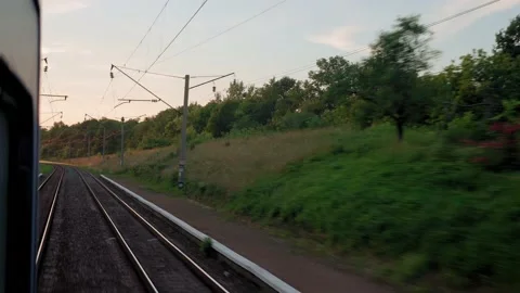 View from window high-speed train on landscape of beautiful nature wild field Stock Footage 159730623