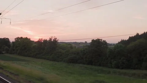 View from window high-speed train on landscape of beautiful nature wild field Stock Footage 162194546