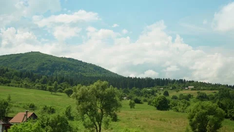 View from window of high-speed train on landscape of beautiful nature wild field Stock Footage 197560909