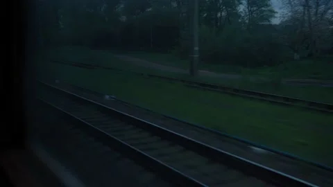 View from window of high-speed train on landscape of beautiful nature wild field Stock Footage 198933430