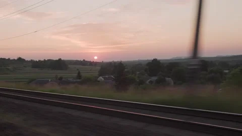 View from window high-speed train on landscape of beautiful nature wild field Stock Footage 210031848