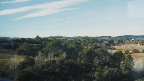 View from the window of high speed train. View on forest and hills. Stock Footage 310827180
