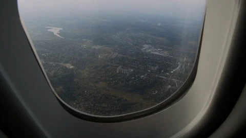 View from the Window of a Jet Plane on the Moscow Russia Landscape Passenger POV Video stock 117439726