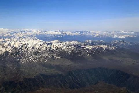 View from window of a jet plane wing with beautiful weather Stock Photos