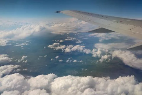 View from window of a jet plane wing with beautiful weather 写真素材