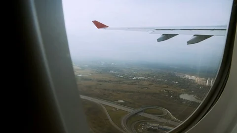 View from the Window of a Jet. Russian Landscape Plane Wing. POV of passenger 스톡 동영상 117543805