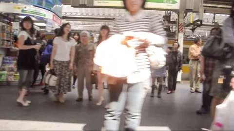 View from window of JR  train arriving in Shinjuku station in Tokyo Stock Footage 74088669