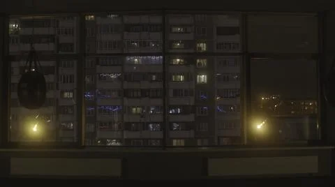 View from the window of a large empty training hall to the high residential Stock Illustration