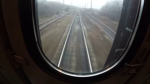 View from window of last moving train carriage or waggon, sleepers and rails Stock Footage 85110543