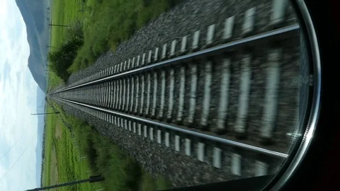 The view from the window of the last waggon of the train on a runaway ties. Stock Footage 81576904