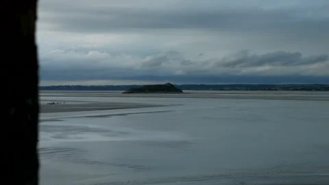 View from the window of a medieval fort. Bay during low tide. Mont Saint Michel. Video stock 324499228