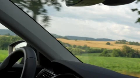 View from the window of moving car of the countryside Stock Footage 290820690