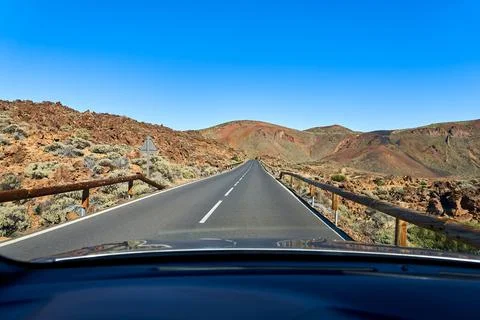 View from the window of a moving car on an empty and deserted highway in th.. Stock Photos